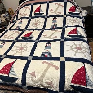 Nautical Themed Quilt with Sailboat and Lighthouse Design